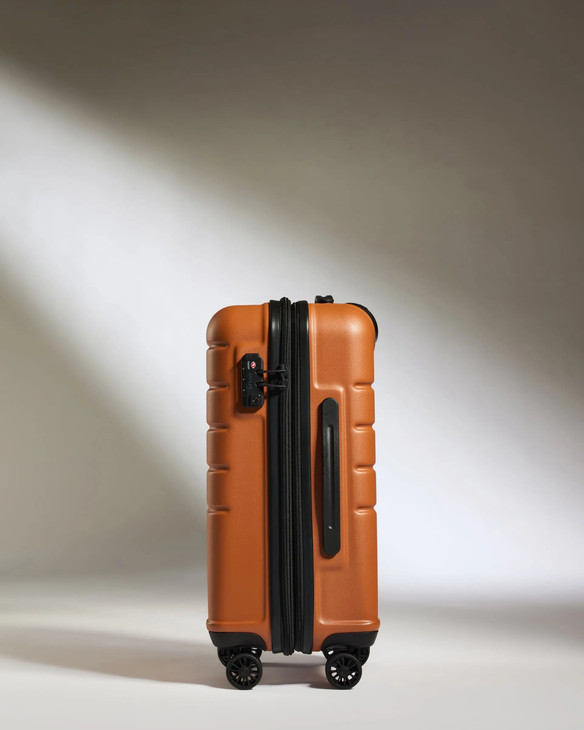 Expandable Carry-on Luggage in Amber - Logo