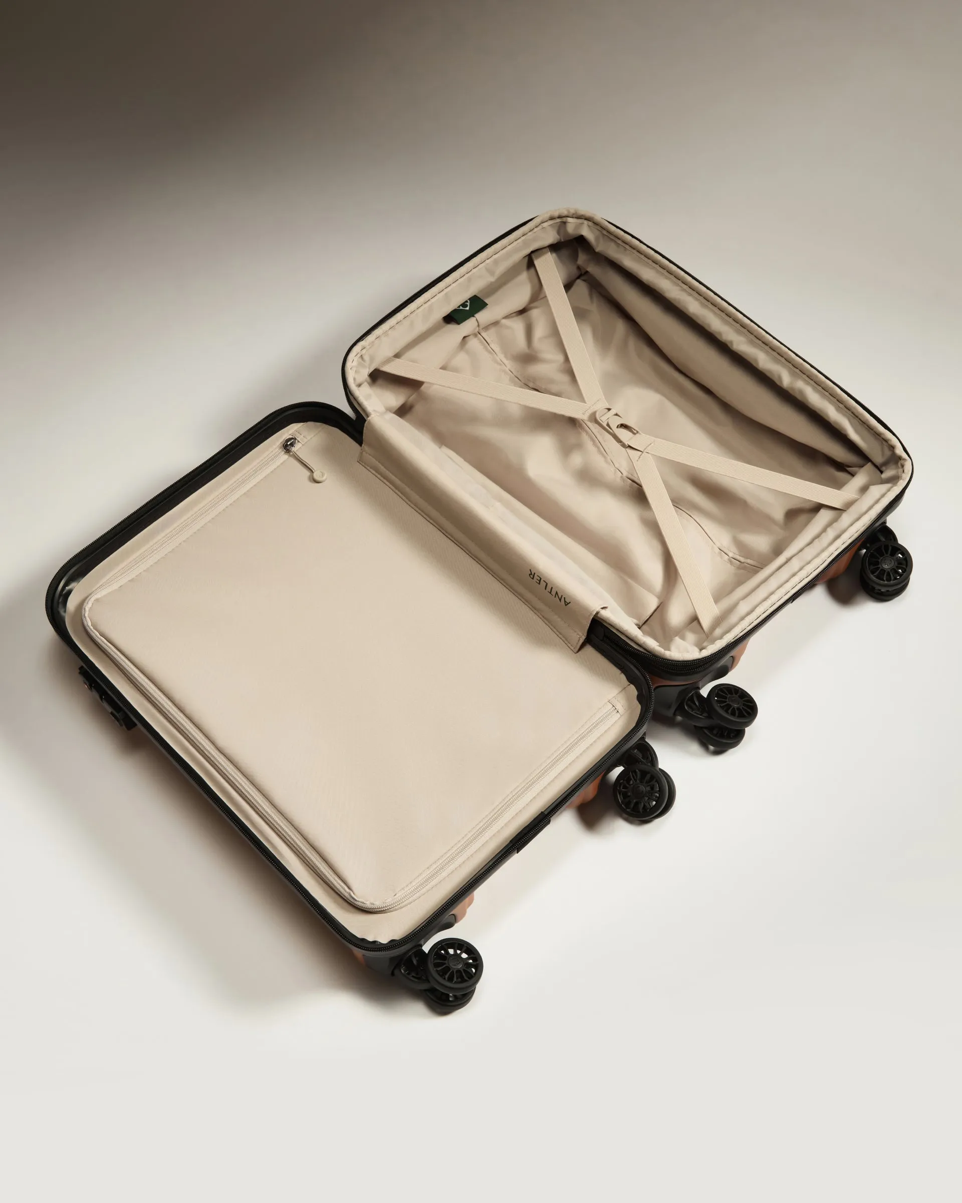 Expandable Carry-on Luggage in Amber - Logo