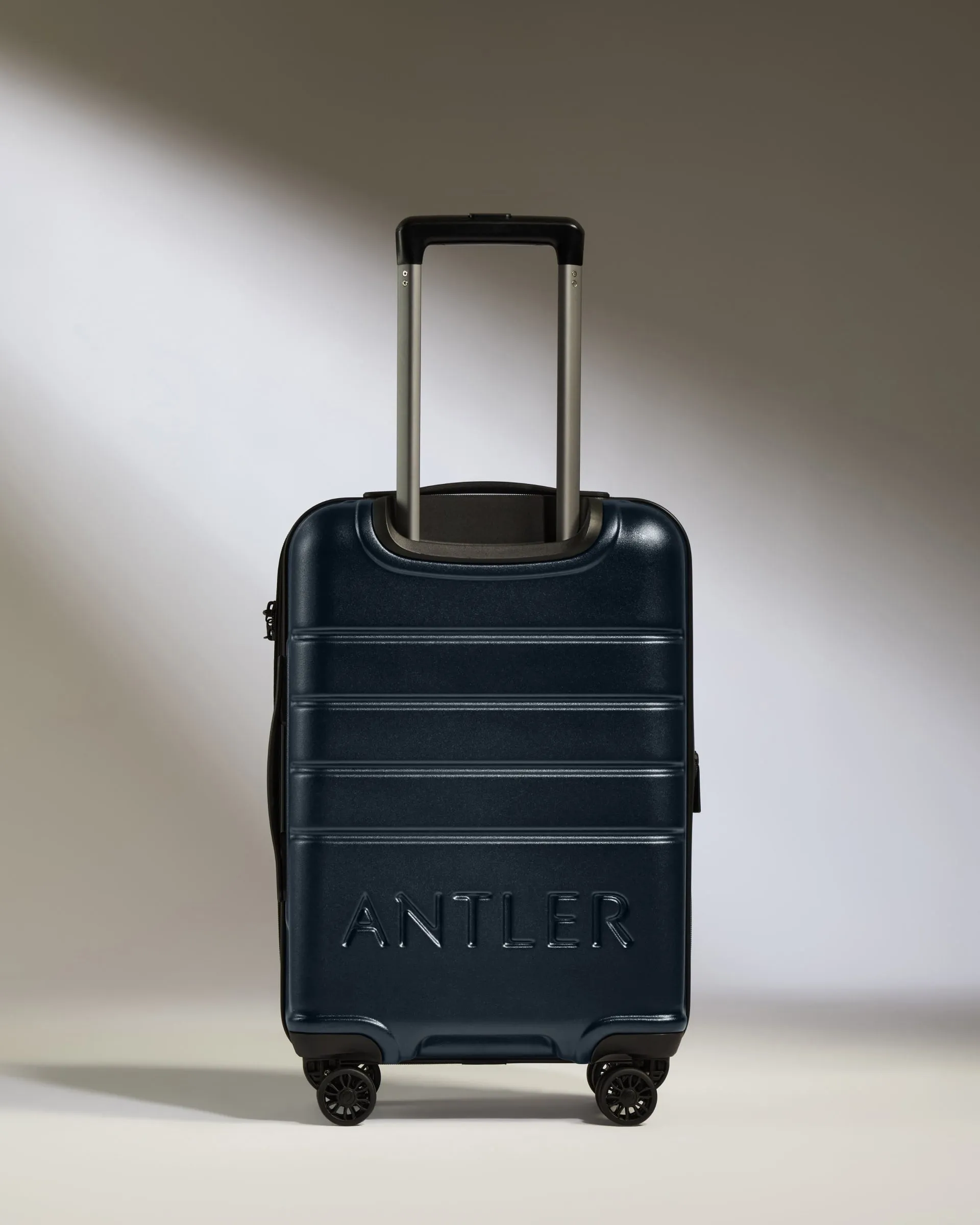 Expandable Carry-on Luggage in Dark Navy - Logo