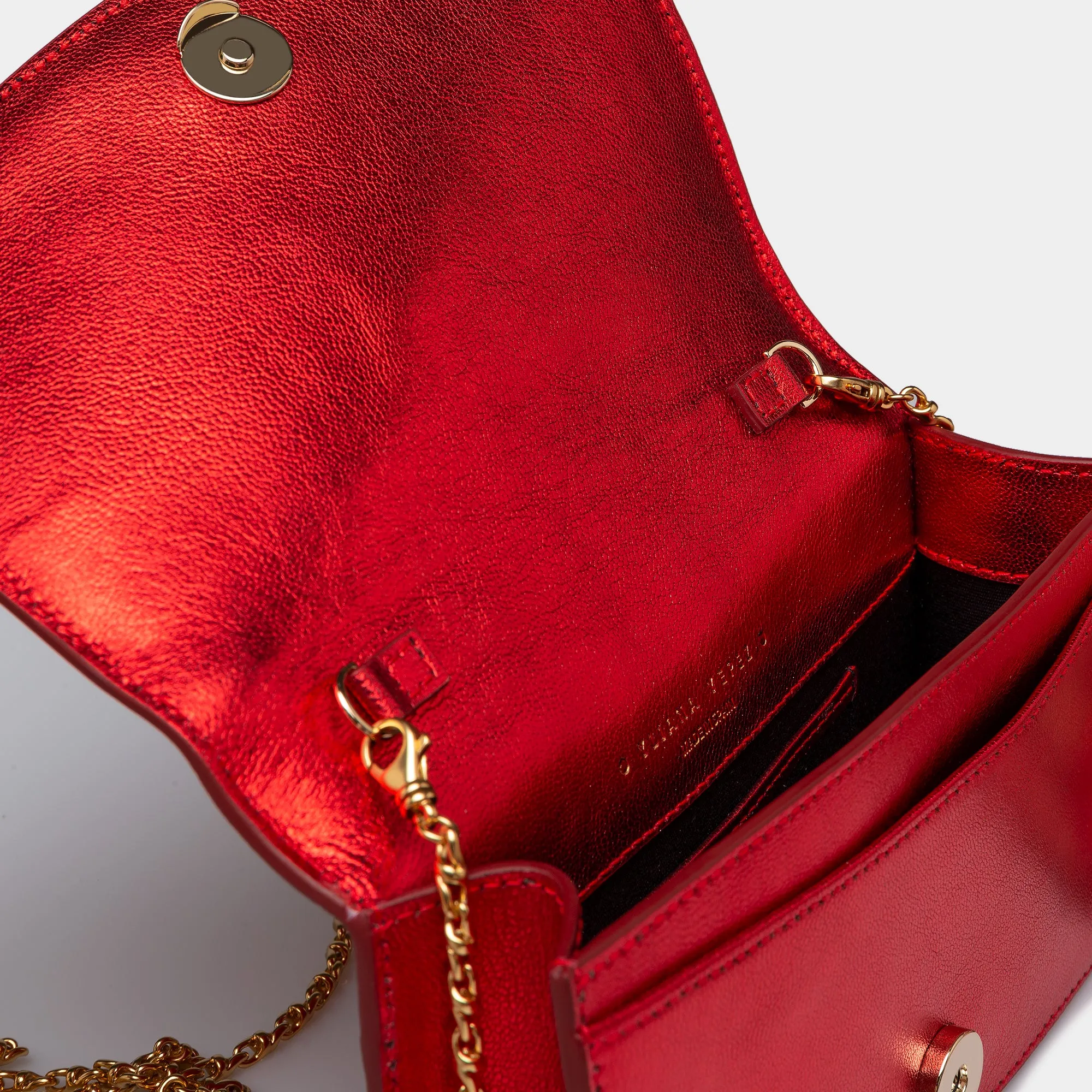 Lea red metallic braided clutch