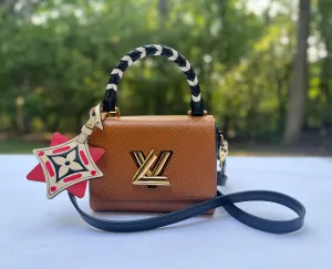 Louis Vuitton Epi Leather Crafty Twist Mini in Canelle
