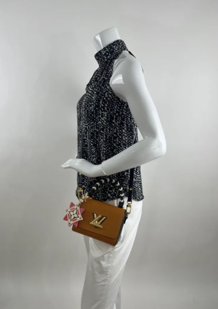 Louis Vuitton Epi Leather Crafty Twist Mini in Canelle