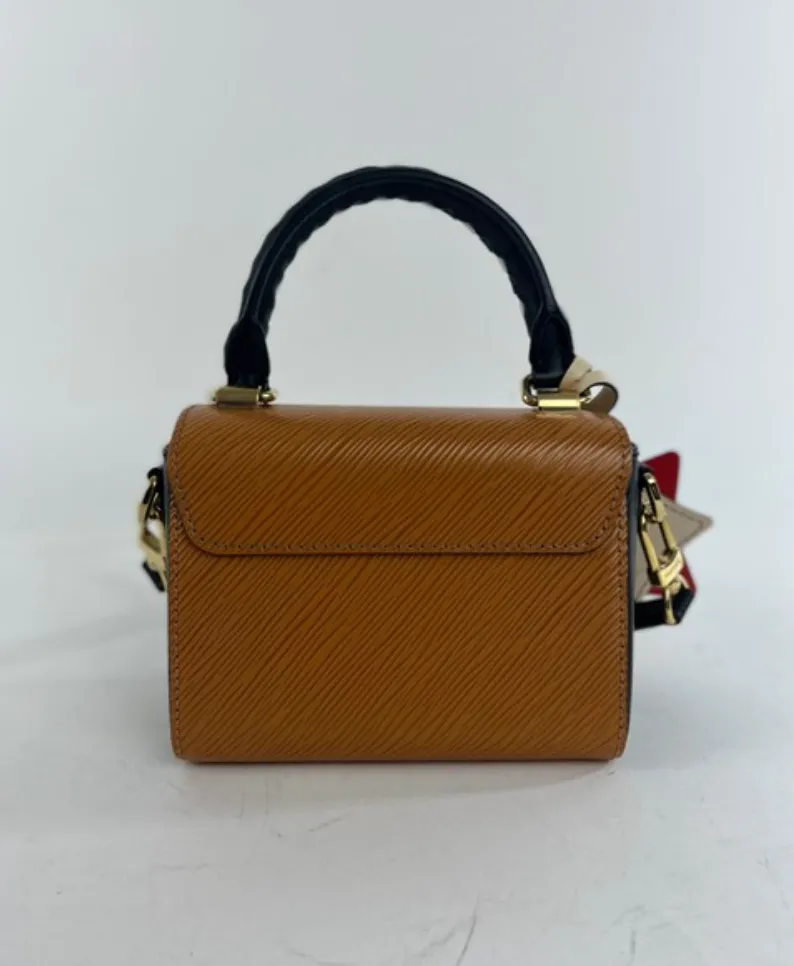 Louis Vuitton Epi Leather Crafty Twist Mini in Canelle