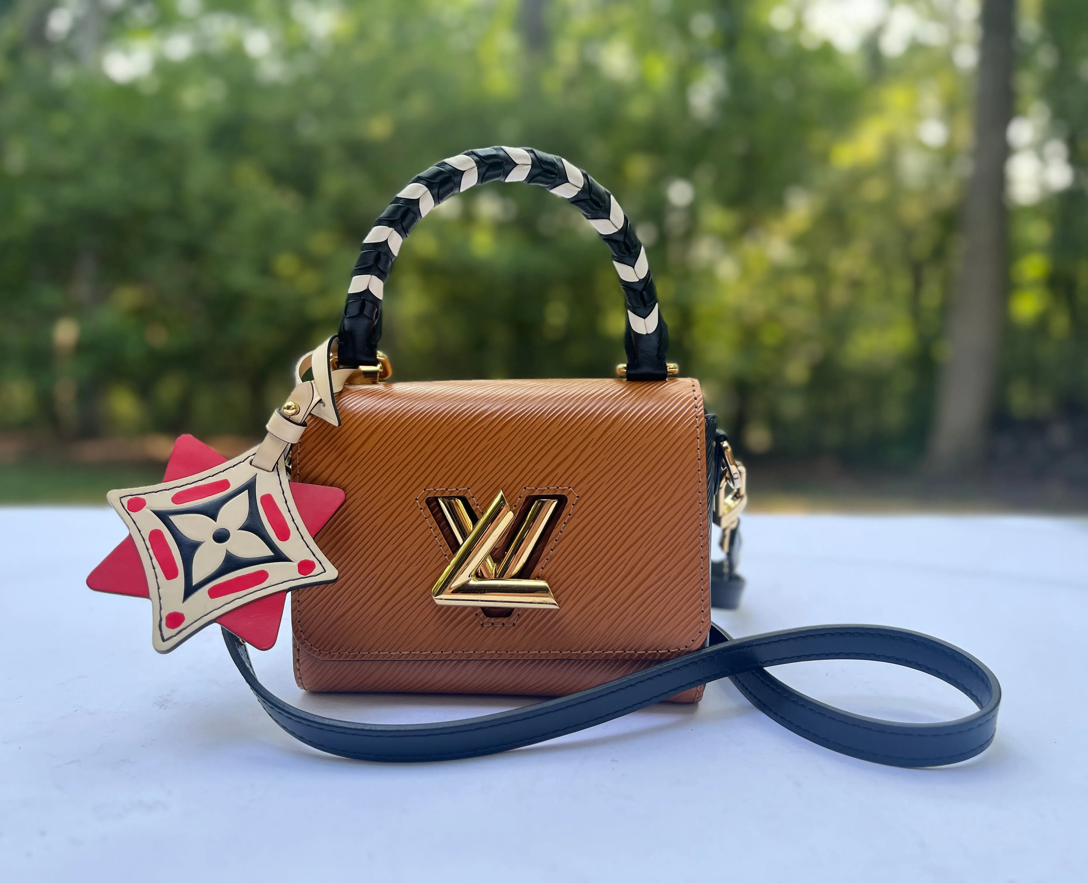 Louis Vuitton Epi Leather Crafty Twist Mini in Canelle