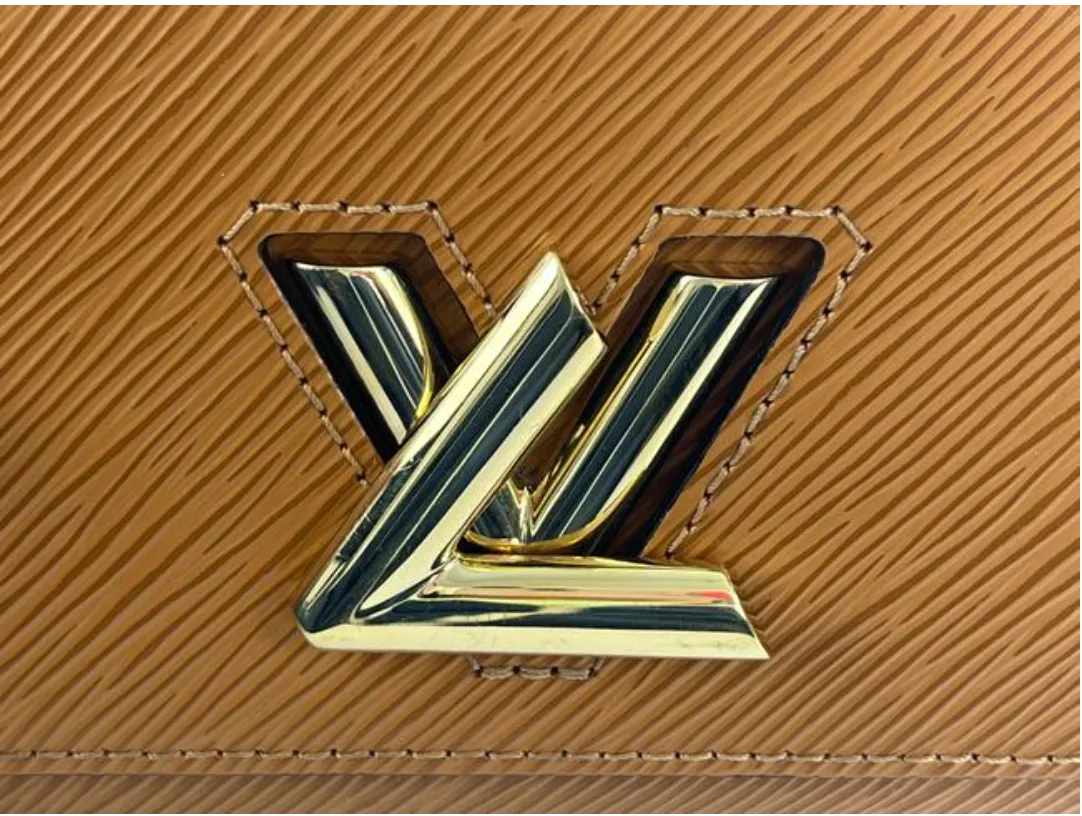 Louis Vuitton Epi Leather Crafty Twist Mini in Canelle