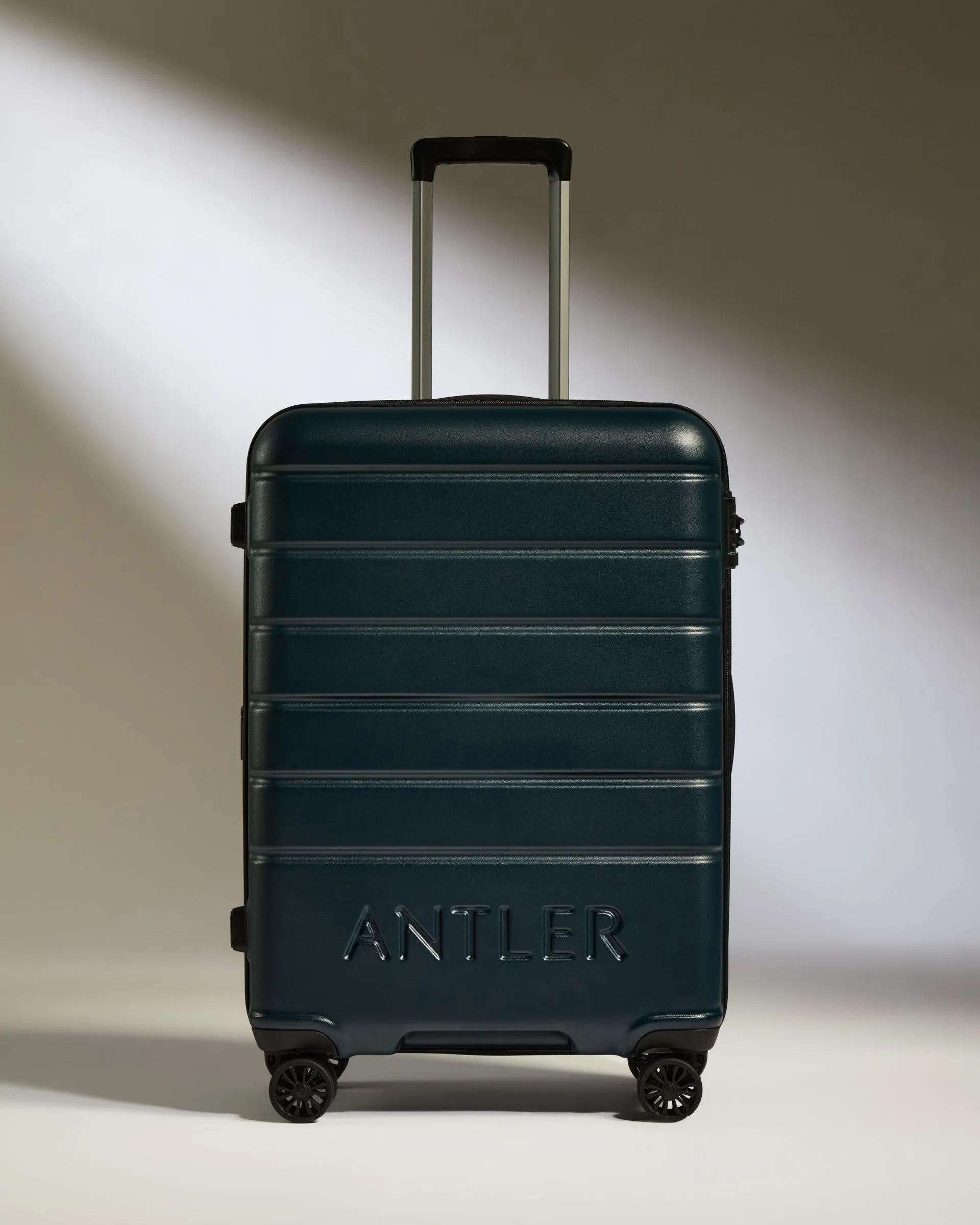 Medium Luggage in Midnight Blue - Logo