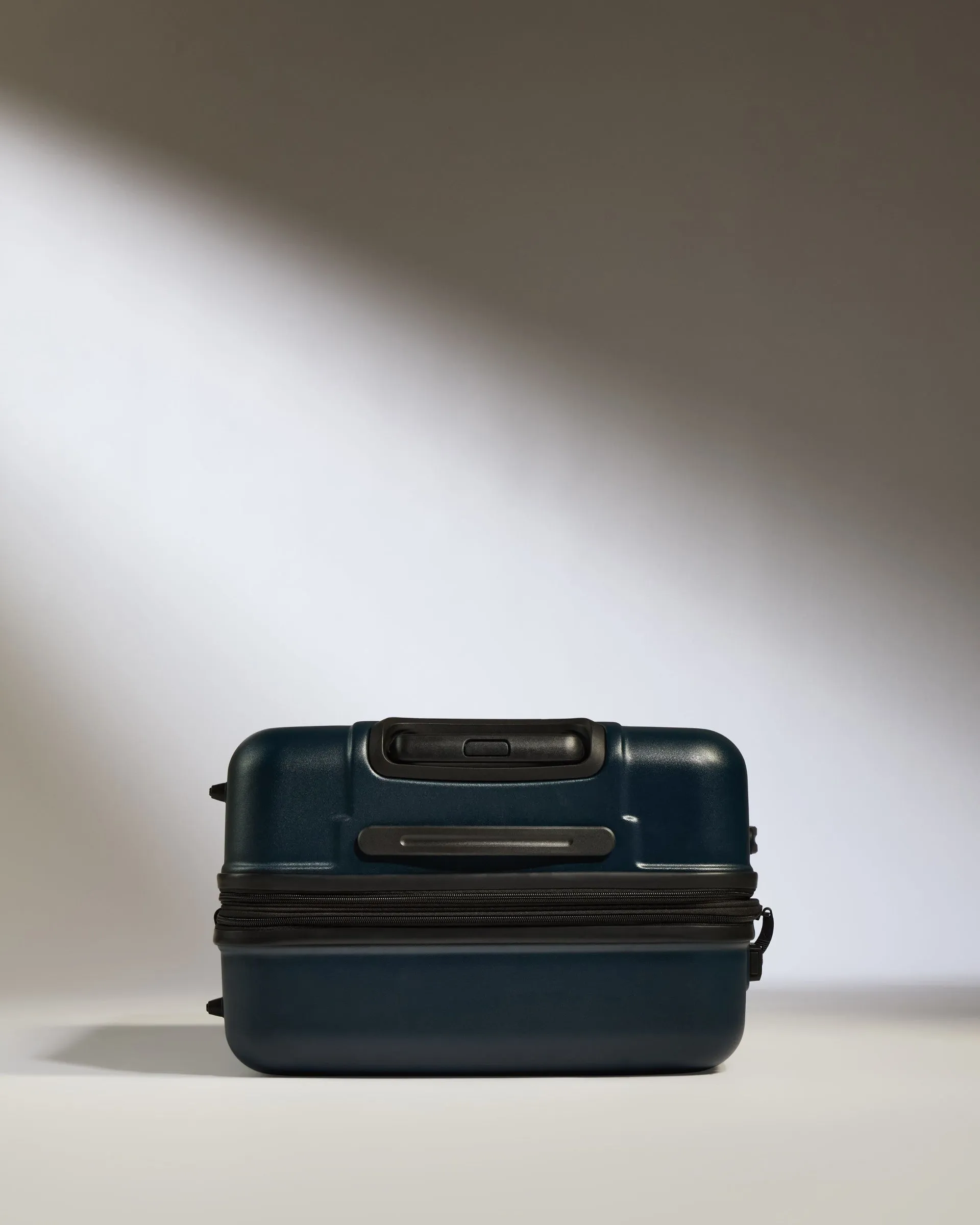 Medium Luggage in Midnight Blue - Logo
