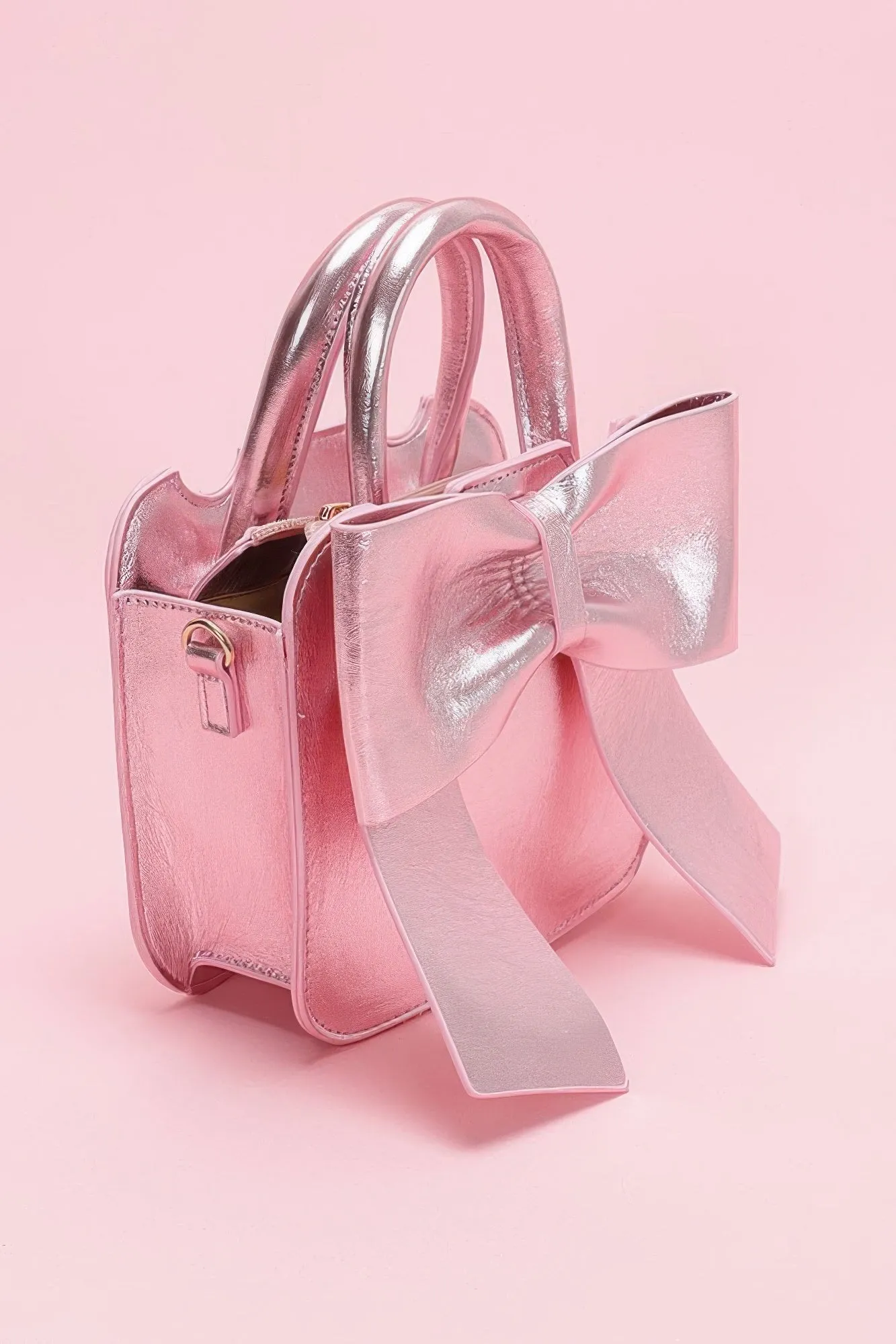 Metallic Bow Front Top Handle Clutch