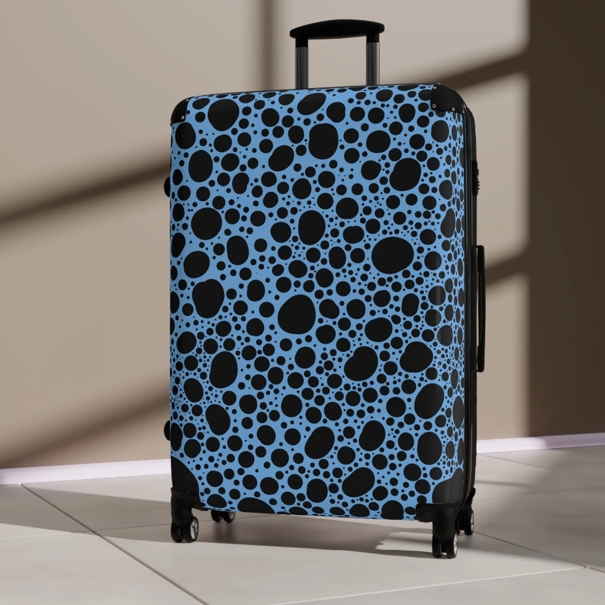 Noir Pointallism on Light Blue Suitcase
