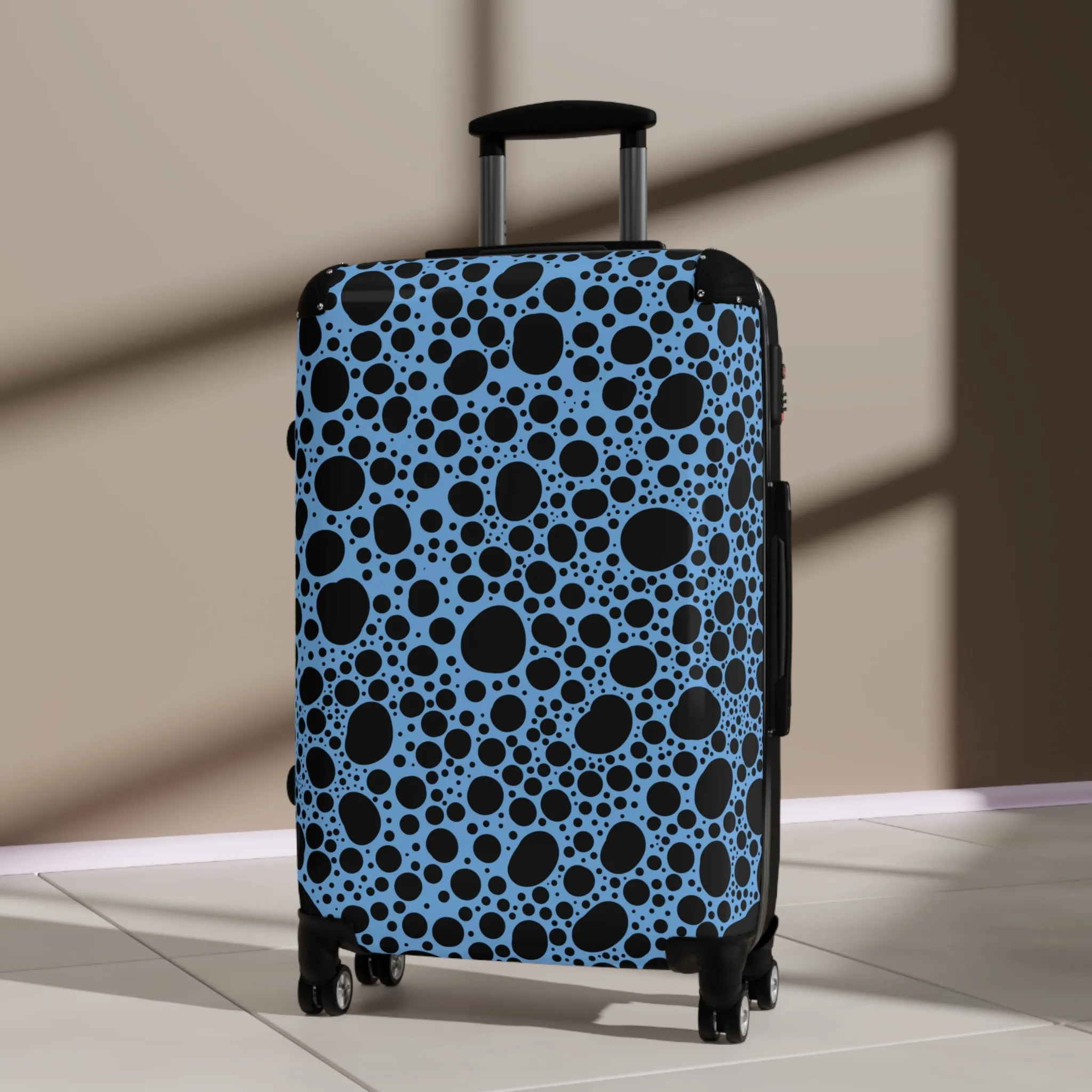 Noir Pointallism on Light Blue Suitcase