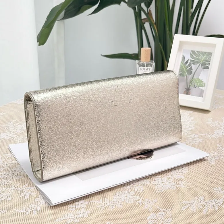 Pre-loved YSL Silver Metallic Leather Clutch Bag